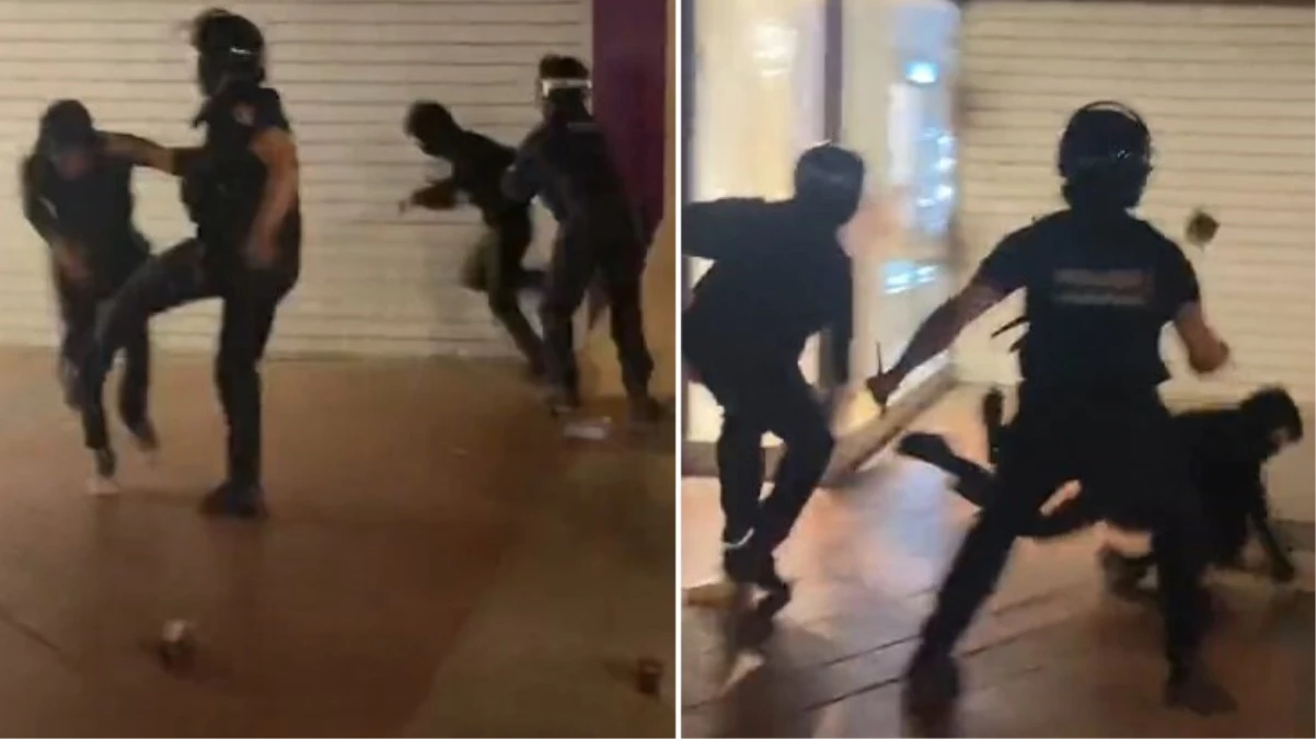 Fransa'da kaos hakim! Kalabalık grup mağazaları yağmalarken polise yakalandı